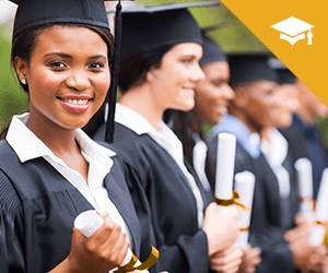 A line of graduates smiling